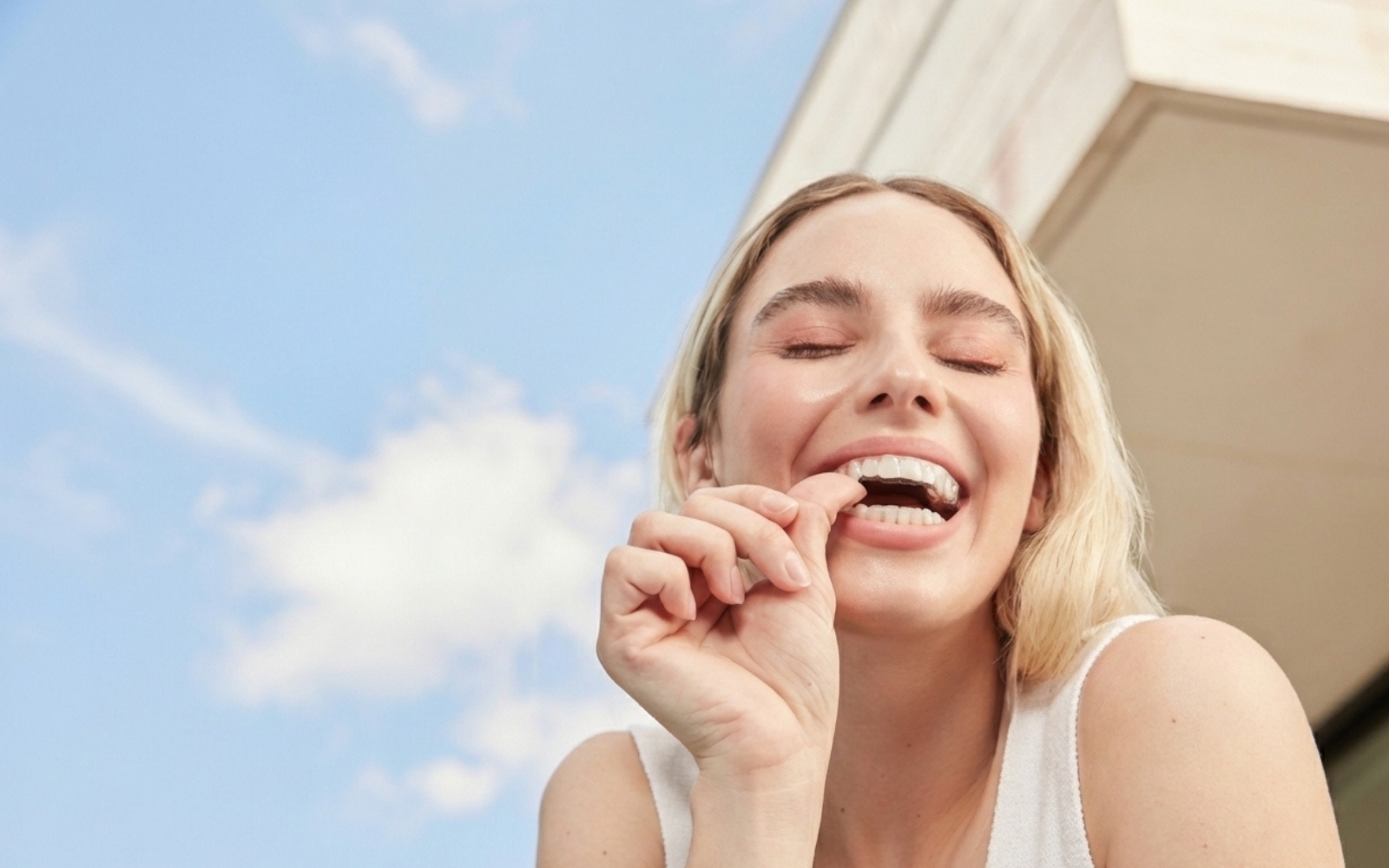 Girl wearing invisalign clear aligners